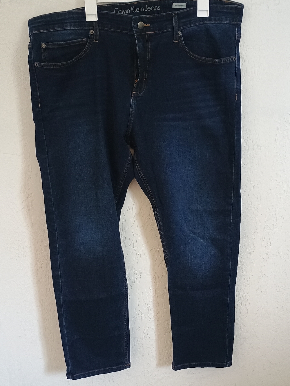 Calvin Klein Jeans Dark Blue Denim with Tan Leather Patch
